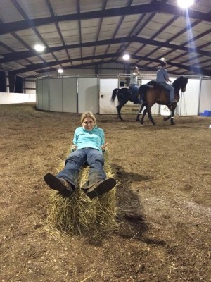 ashton on hay bale